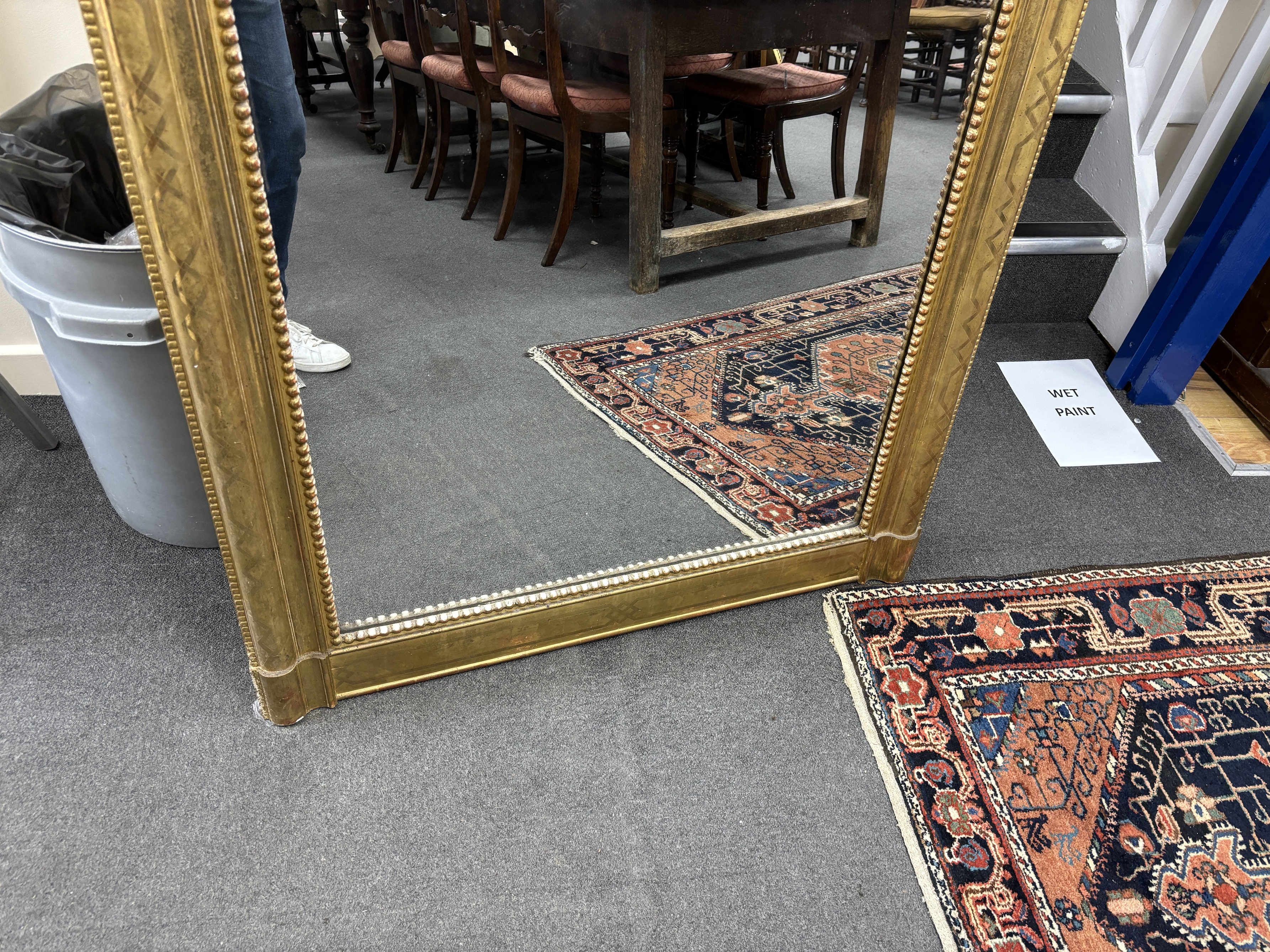 A 19th century French giltwood and composition overmantel mirror, width 101cm, height 167cm